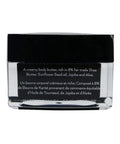 Creamy body butter jar with black lid and clear container on a white background