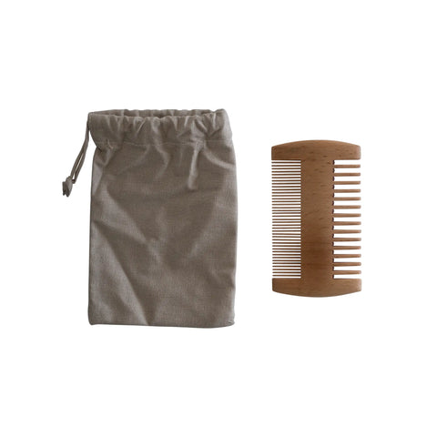 Brown drawstring bag and wooden comb on a white background