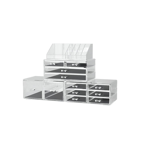 Stack of clear acrylic drawers on a white background