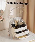Multi-tier storage organizer with skincare products on a marble surface, text 'Multi-tier storage' above.