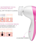 7-in-1 waterproof facial cleansing brush with pink and white design on a white background