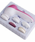 Set of facial cleansing brushes in a white box on a white background