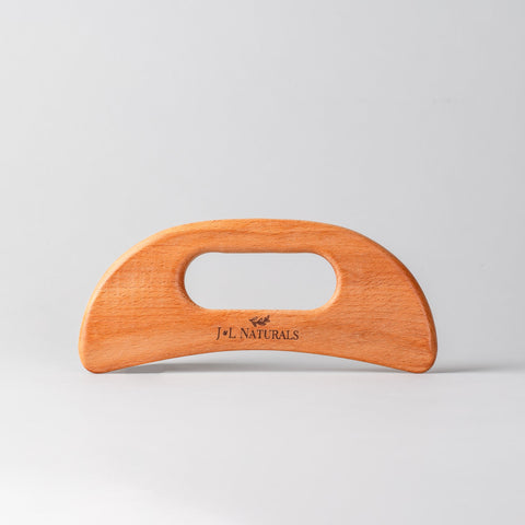 Wooden product with 'J&L Naturals' branding on a gray background