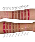 Lip Gloss swatches on a person's arm with color names below each swatch.