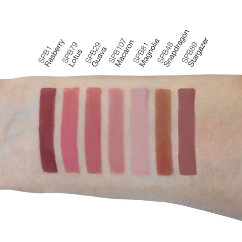 Lipstick swatches on a arm with color names above