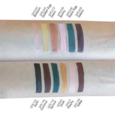 Color swatches of a makeup product on a arm with labeled shades.