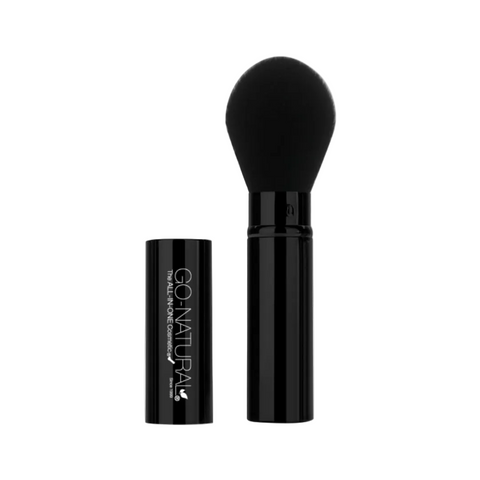 Black makeup brush with black handle on a white background