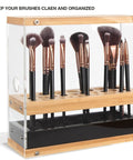 Makeup brush holder with brushes on a white background
