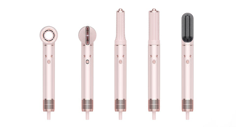 Set of rose gold hair styling tools with interchangeable attachments on a white background
