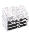 Clear acrylic cosmetic organizer with black drawers on a white background